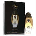Niche Emarati Remas by Lattafa unisex fragrance. Elegant gold oval bottle with intricate textured cap and sleek black box. 3.4 oz.