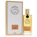 Luxurious Nicolai Rose Oud 3.4 oz unisex EDP. Golden liquid in a clear bottle with gold cap, beside an elegant white and gold box.