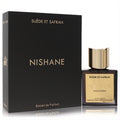 Sophisticated Nishane Suede et Saffron Extrait de Parfum bottle, dark glass with gold accents, next to its elegant black box.