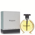 Volnay Objet Celeste 3.4 oz Eau De Parfum: elegant round glass bottle with golden liquid, black cap, and white branded box.