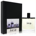 Sophisticated Olfactive Studio Still Life 3.4 oz unisex EDP. Clear glass bottle, black cap, sleek box with unique art.