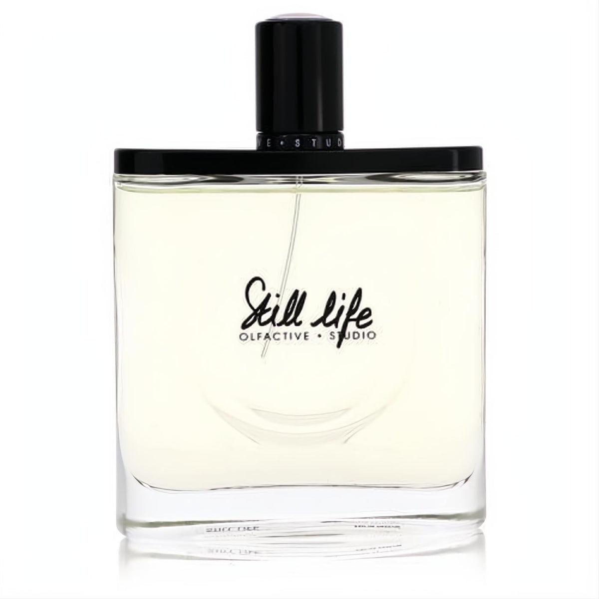 Olfactive Studio Still Life unisex EDP. Clear glass bottle with pale amber liquid, sleek black cap, and elegant black script.