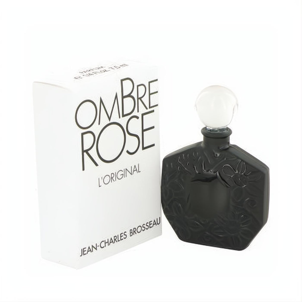Ombre Rose by Brosseau .25 oz pure perfume. Elegant black bottle with embossed floral design, white cap, and matching white box.