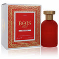 Bois 1920 Oro Rosso 3.4 oz EDP: a striking matte red bottle with gold cap, beside its luxurious white and gold ornate box.