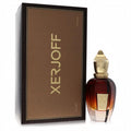 Luxurious Xerjoff Oud Stars Al-Khatt 1.7 oz EDP. Ornate amber glass bottle with gold cap and elegant textured brown box.