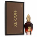 Exquisite Xerjoff Fars Oud 1.7 oz amber glass perfume bottle with ornate gold cap, beside its luxurious brown and gold box.