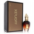 Exquisite Xerjoff Oud Stars Zafar 1.7 oz EDP, featuring a dark amber glass bottle with a unique gold cap and a luxurious textured brown box.