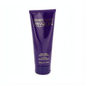 Elizabeth Taylor's Passion 6.8 oz perfumed body lotion. Rich deep purple squeeze tube with elegant gold lettering.