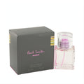 Paul Smith Women 1 oz Eau De Parfum spray in a clear glass bottle with pink liquid, next to its elegant grey box with signature stripes.