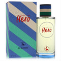 El Ganso Part Time Hero 4.2 oz men's EDT. Clear bottle with bold red 'Hero' text, vibrant blue, green, beige striped cap & matching box.