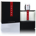 Prada Luna Rossa Carbon men's 5.1 oz cologne. Sleek black and clear bottle with iconic red stripe and silver cap.