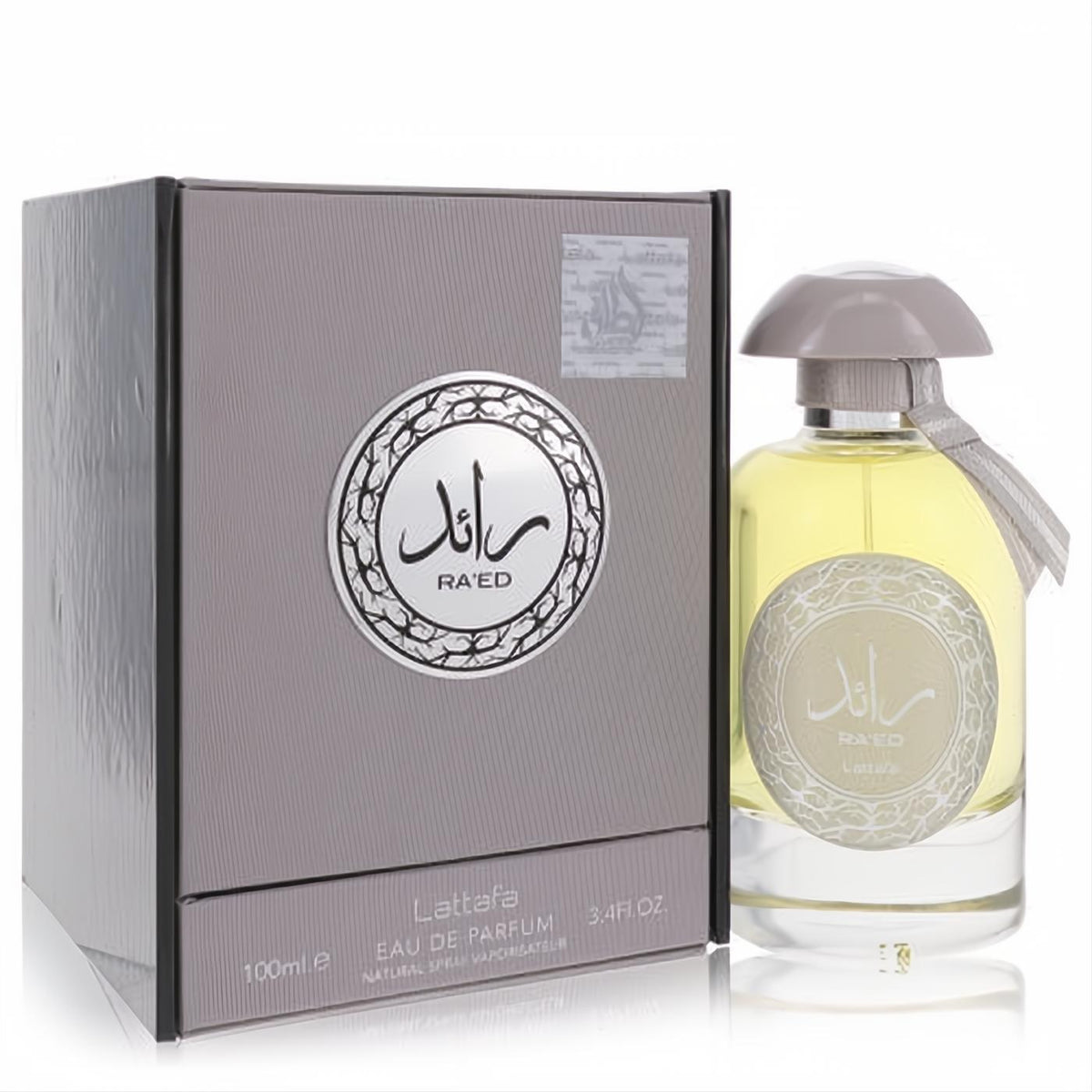 Elevate your scent with Raed Silver Lattafa unisex EDP, 3.4 oz. Clear bottle, grey cap with ribbon, elegant textured box.