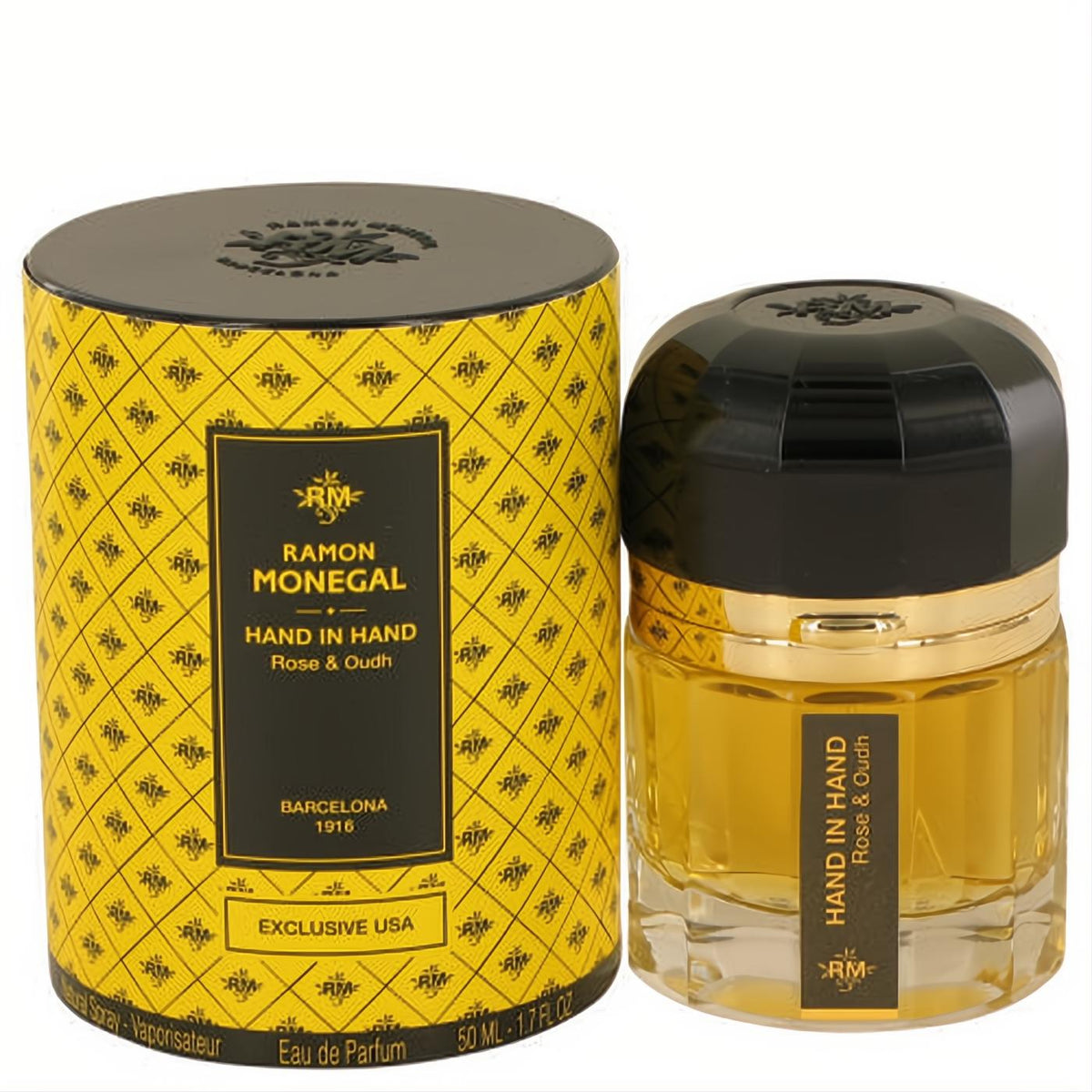 Ramon Monegal Hand in Hand Rose & Oud 1.7 oz EDP. Elegant faceted glass bottle, black cap, and distinctive yellow patterned box.