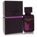 Sophisticated Rasasi La Yuqawam Orchid Prairie 2.5 oz women's EDP. Dark plum bottle, bold purple leaf design, and matching box.