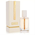 Luxurious Rasasi Musk Hareer 1.67 oz unisex EDP. Clear bottle with golden liquid, white cap, and elegant cream-gold box.