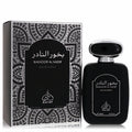 Rayef Bakhoor Al Nadir 3.4 oz unisex Eau De Parfum. Distinctive black bottle, silver cap, and elegant patterned box for a luxurious scent.