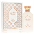 Rayef Musk Fareed 3.4 oz unisex EDP spray in a luxurious white bottle with a gold cap and matching ornate Arabic design box.