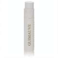 Elegant white Reminiscence Guimauve .04 oz sample spray vial with gold lettering, ideal for trying this modern fragrance.
