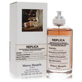 Unisex Maison Margiela Replica Coffee Break 3.4 oz EDT. Amber fragrance in a sleek glass bottle with a white label and matching box.