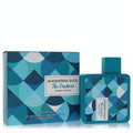 Mandarina Duck Resort Lovers 3.4 oz EDT. Striking teal geometric bottle & box, evoking a fresh, aquatic escape.