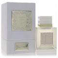 Stunning Rihanah Velvet Musk 4.2 oz EDP. Clear glass bottle with ornate gold label and luxurious white gift box.