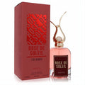 Riiffs Rose De Soleil 3.4 oz Eau De Parfum. Radiant pink fragrance in a clear bottle with an elegant gold ornate cap, next to its deep red box.