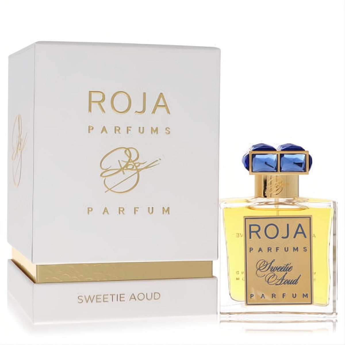 Exquisite Roja Sweetie Aoud 1.7 oz unisex perfume in a clear bottle with a dazzling blue jeweled cap and elegant white gold box.