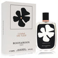 Sophisticated Roos & Roos Comme Une Fleur unisex EDP. Clear 3.3 oz bottle features a white floral design on black, with a matching elegant white box.