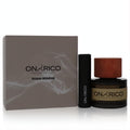 Onyrico Rossa Boheme fragrance set: elegant grey box, sleek black spray, and dark amber bottle with a rustic wooden cap.
