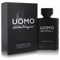 Sophisticated matte black Salvatore Ferragamo Uomo Signature men's EDP 3.4 oz spray bottle and matching box with silver lettering.
