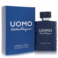 Modern blue Salvatore Ferragamo Uomo Urban Feel men's Eau De Toilette spray bottle, silver accents, and matching box.