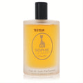 Sophisticated Sophie La Girafe Eau de Soin Parfumee tester. Frosted glass bottle with golden liquid, black cap, and iconic giraffe logo.