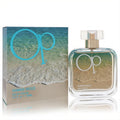 Ocean Pacific Summer Breeze 3.4 oz women's perfume. Clear glass bottle with a refreshing beach-gradient liquid, gold neck, and matching box.