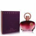 Afnan Supremacy Pour Femme 3.4 oz perfume. Luxurious red gradient glass bottle, unique rose gold loop cap, and elegant purple box.