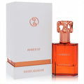 Luxurious Swiss Arabian Amber 07 unisex EDP 1.7 oz. Features a radiant amber bottle, intricate rose gold cap, and elegant white box.