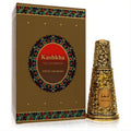 Luxurious Swiss Arabian Kashkha unisex perfume in an ornate gold filigree bottle with an amber gem cap and matching box.