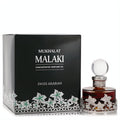 Swiss Arabian Mukhalat Malaki men's perfume oil, a luxurious amber bottle with intricate silver leaf design, beside its elegant black box.