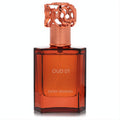Captivating Swiss Arabian Oud 01 fragrance in a sleek amber bottle, crowned with an intricate rose gold cap.