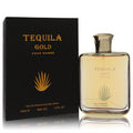 Luxurious Tequila Gold Pour Homme 3.3 oz EDP spray. Clear glass bottle with golden liquid and cap, next to its elegant black box with agave leaf.