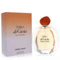 Terra Di Gioia Giorgio Armani 3.4 oz EDP for women. Elegant clear glass bottle, amber pebble cap, warm ombre box.
