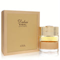 Luxurious The Spirit of Dubai Rimal Eau De Parfum. Golden bottle with ornate cap and elegant matching gold box.