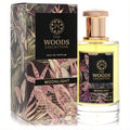 Elegant The Woods Collection Moonlight 3.4 oz unisex Eau De Parfum. Clear bottle, gold cap, and a rich dark botanical box.