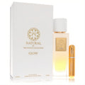 Luxurious Woods Collection Natural Glow 3.4 oz unisex EDP set with sleek gradient glass bottle and gold refillable travel spray.