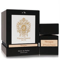 Luxurious Tiziana Terenzi Akragas Extrait de Parfum. Sleek black bottle and box with elegant gold logo and natural wood accents.