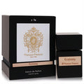 Tiziana Terenzi Ecstasy Extrait de Parfum in sleek black bottle and luxurious matching box with gold crest and wood accents.