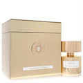 Stunning Tiziana Terenzi Mirach 3.38 oz extrait de parfum in a gold bottle with metallic cap, next to its elegant embossed gold box.
