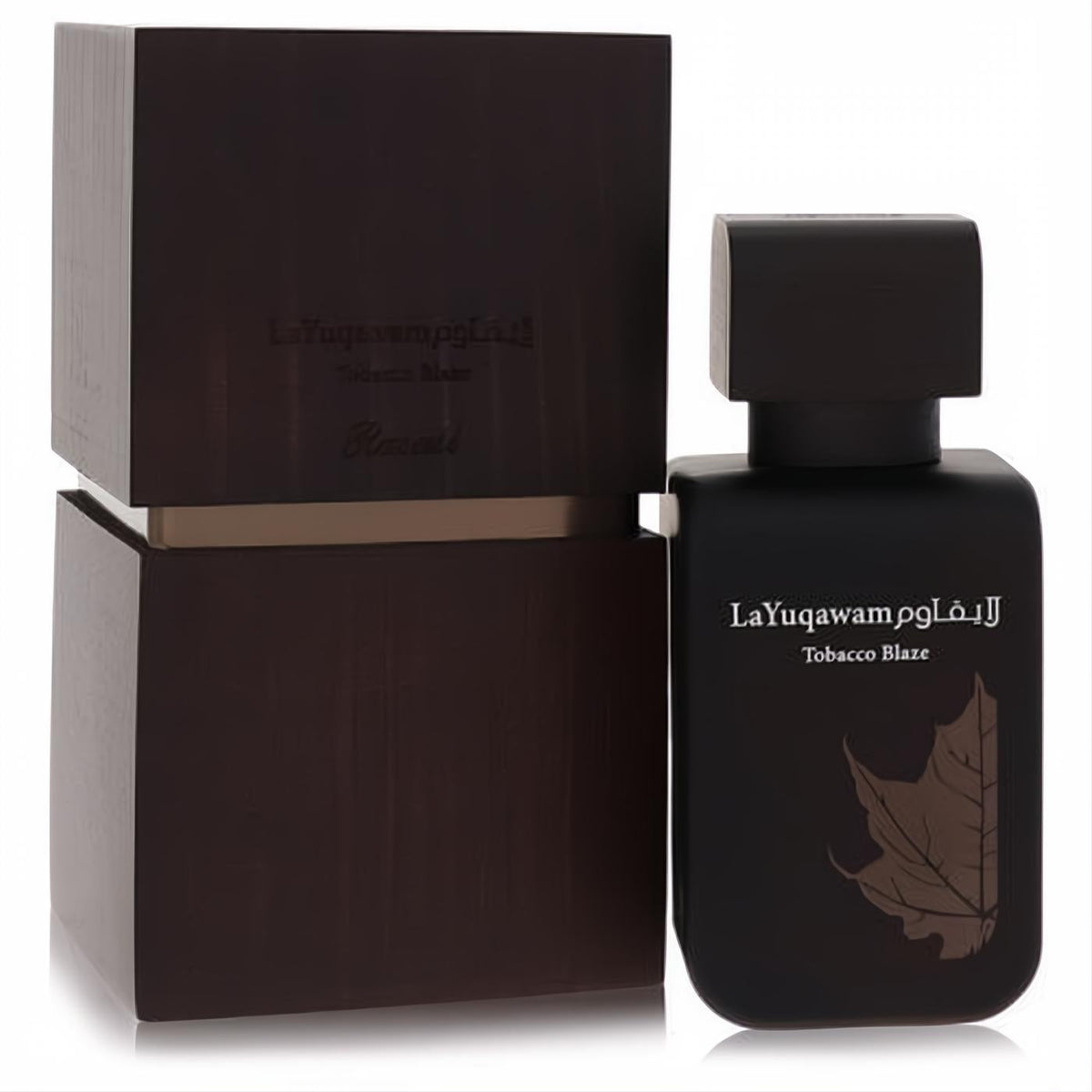 Luxurious matte black Rasasi Tobacco Blaze EDP spray bottle with a subtle brown leaf design, displayed beside its elegant dark wood box.