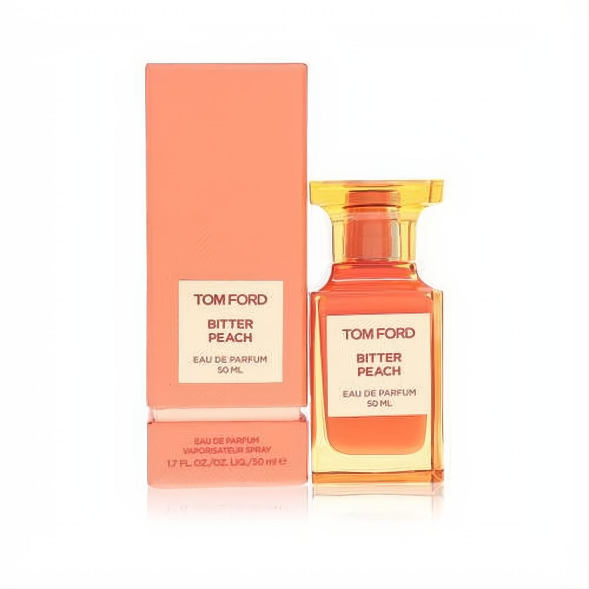 Elegant Tom Ford Bitter Peach 1.7 oz (50ml) unisex Eau De Parfum spray in a peach-amber glass bottle with matching box.