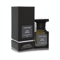 Tom Ford Oud Wood 50ml Eau De Parfum in a sleek black bottle with matching box, exuding luxury.