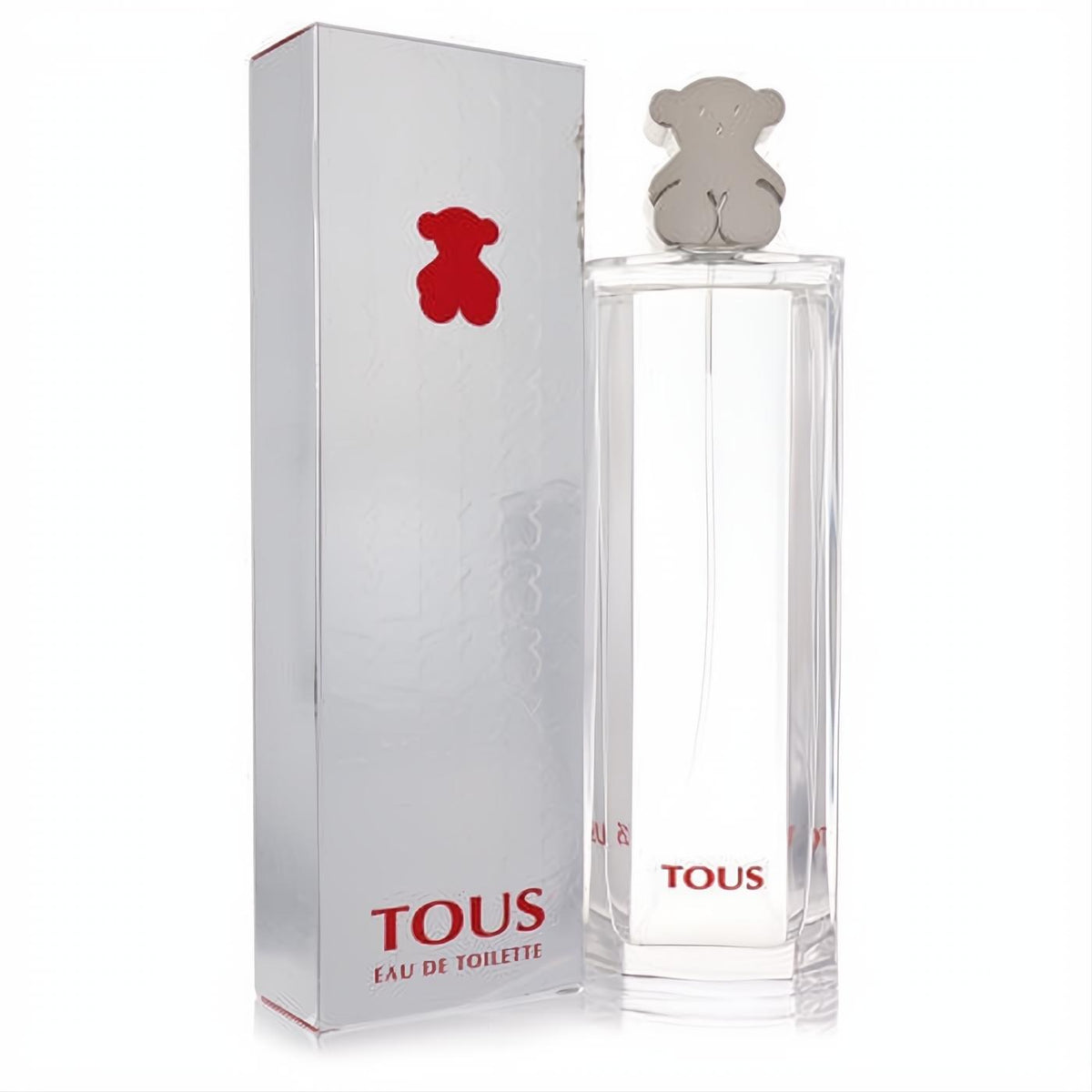 Exquisite Tous Eau De Toilette 3 oz spray. Clear glass bottle, signature silver bear cap, and elegant silver box with red logo.